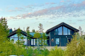 Ny eksklusiv hytte, strøm og jacuzzi inkl i prisen